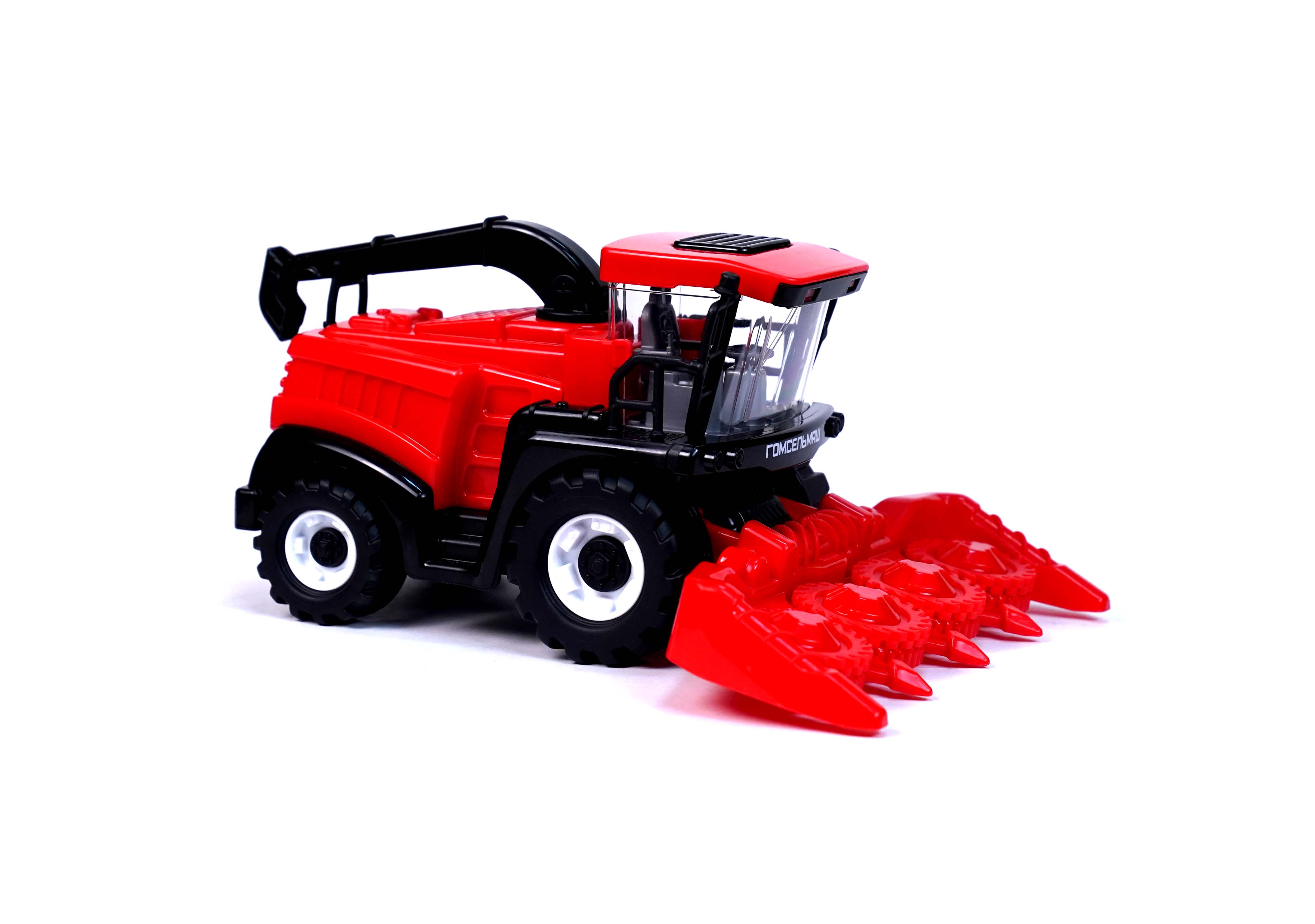 Игрушка комбайн кормоуборочный в сетке